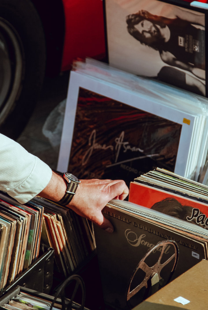 A man choosing a record to buy at The Sub Rooms in Stroud